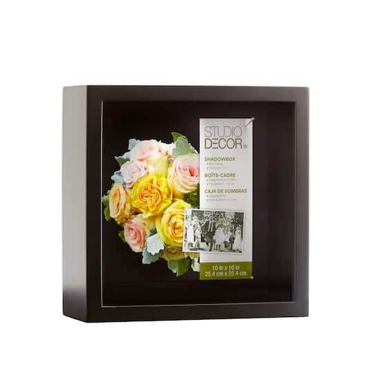 10x10 shadow box by Studio Decor from Michael's. Pictures flower bouquet inside in addition to Studio Decor's advertising text, which is mostly illegible.